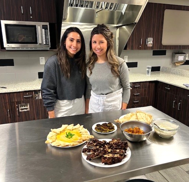 Two students in the food lab