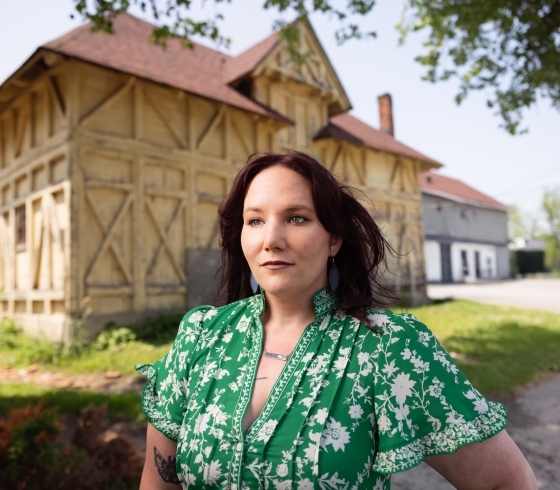 Emily Jarnot in front of Vaux Barn